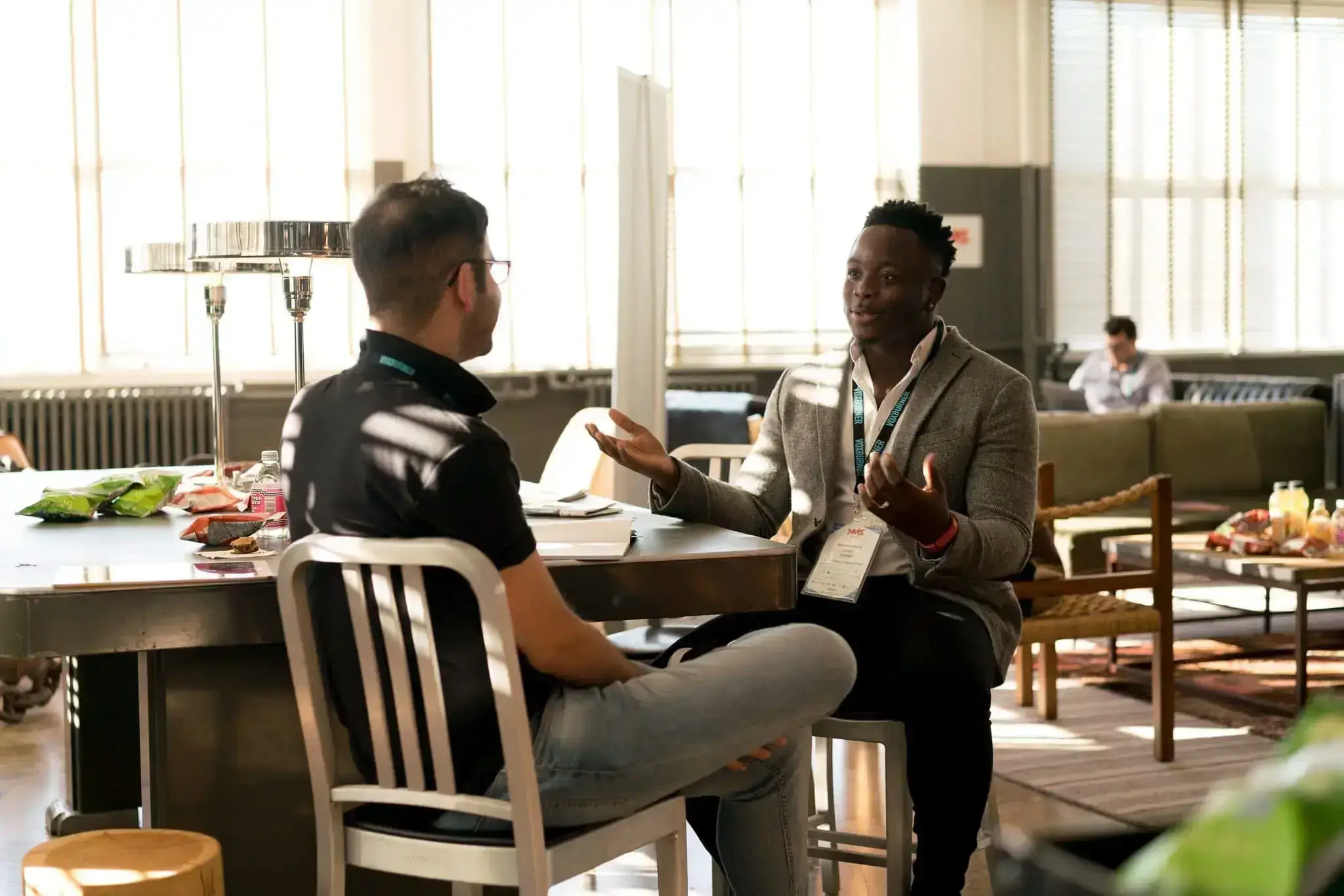 two men having a casual conversation